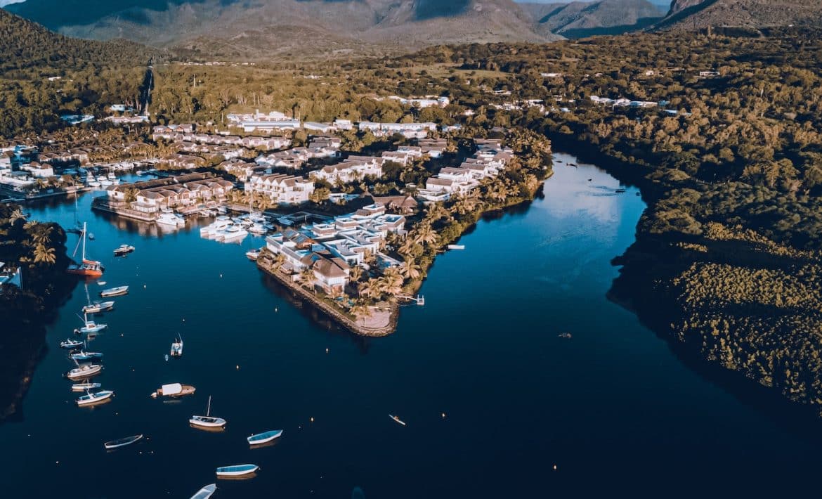 an aerial view of a marina with boats in the water