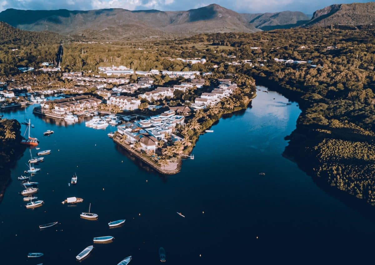 an aerial view of a marina with boats in the water